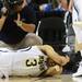 Michigan sophomore Trey Burke holds his head after taking a nasty fall reaching for a rebound against South Dakota State in the second half of the second round of the NCAA tournament at the Palace in Auburn Hills on Thursday, March 21, 2013. Melanie Maxwell I AnnArbor.com